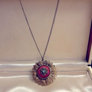Vintage good tone necklace with blue rhinestone center !